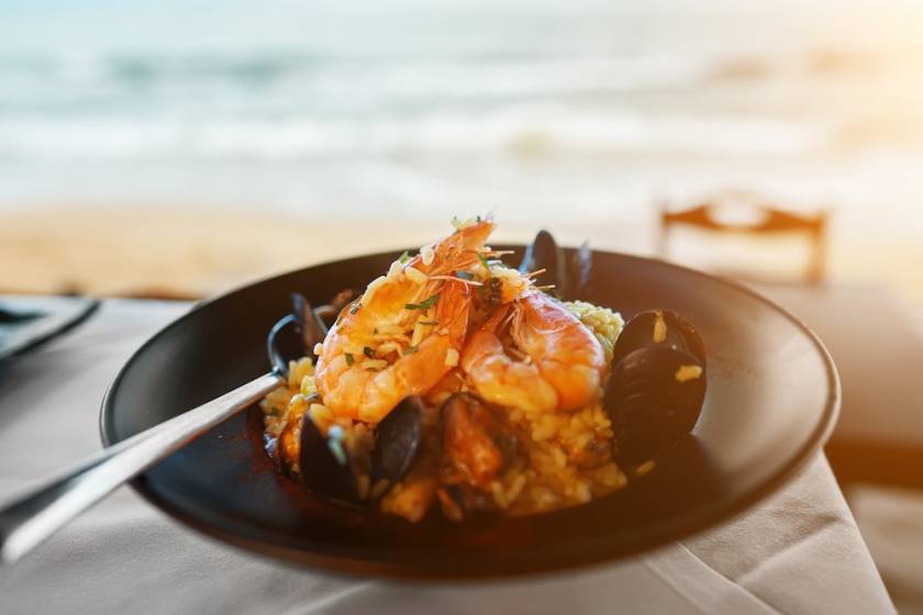 seafood on a table at a beachfront restaurant 