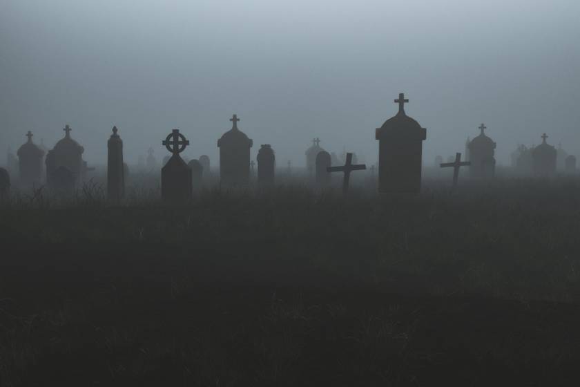 spooky cemetary at night